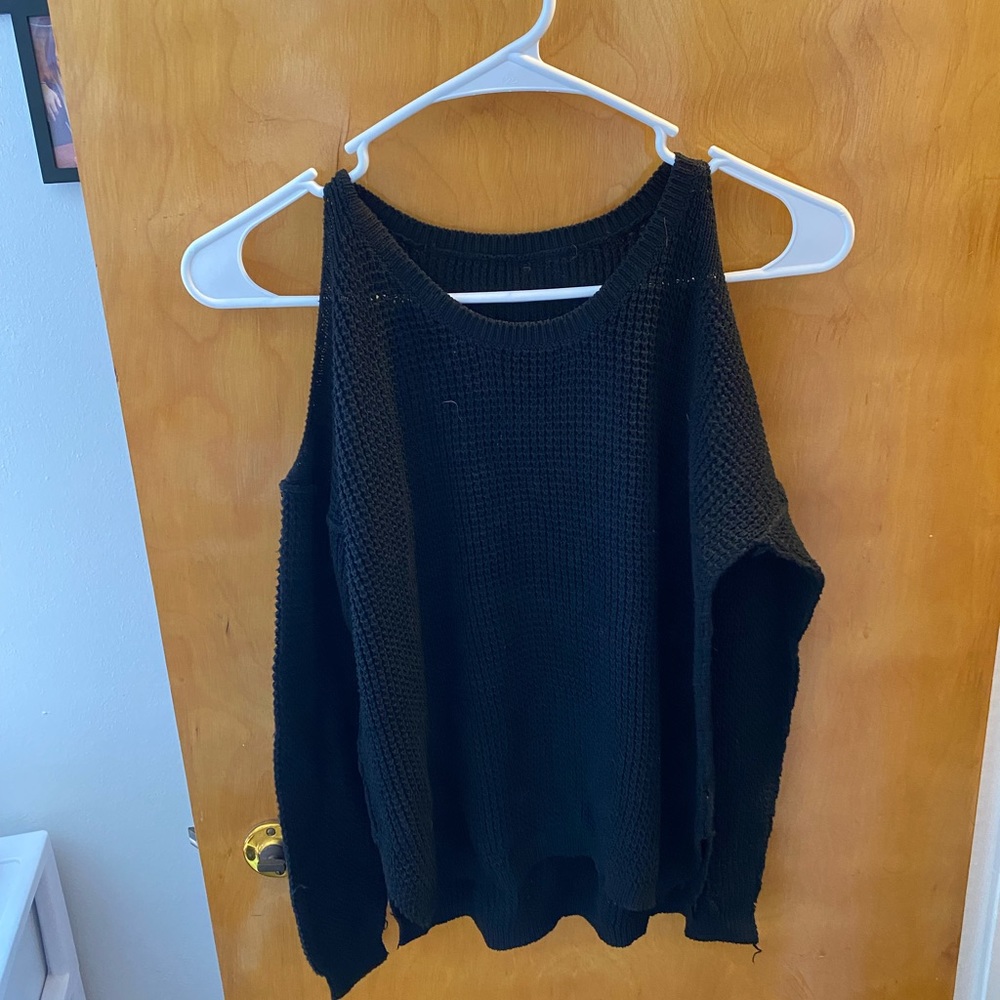 Black sweater with shoulder cutouts